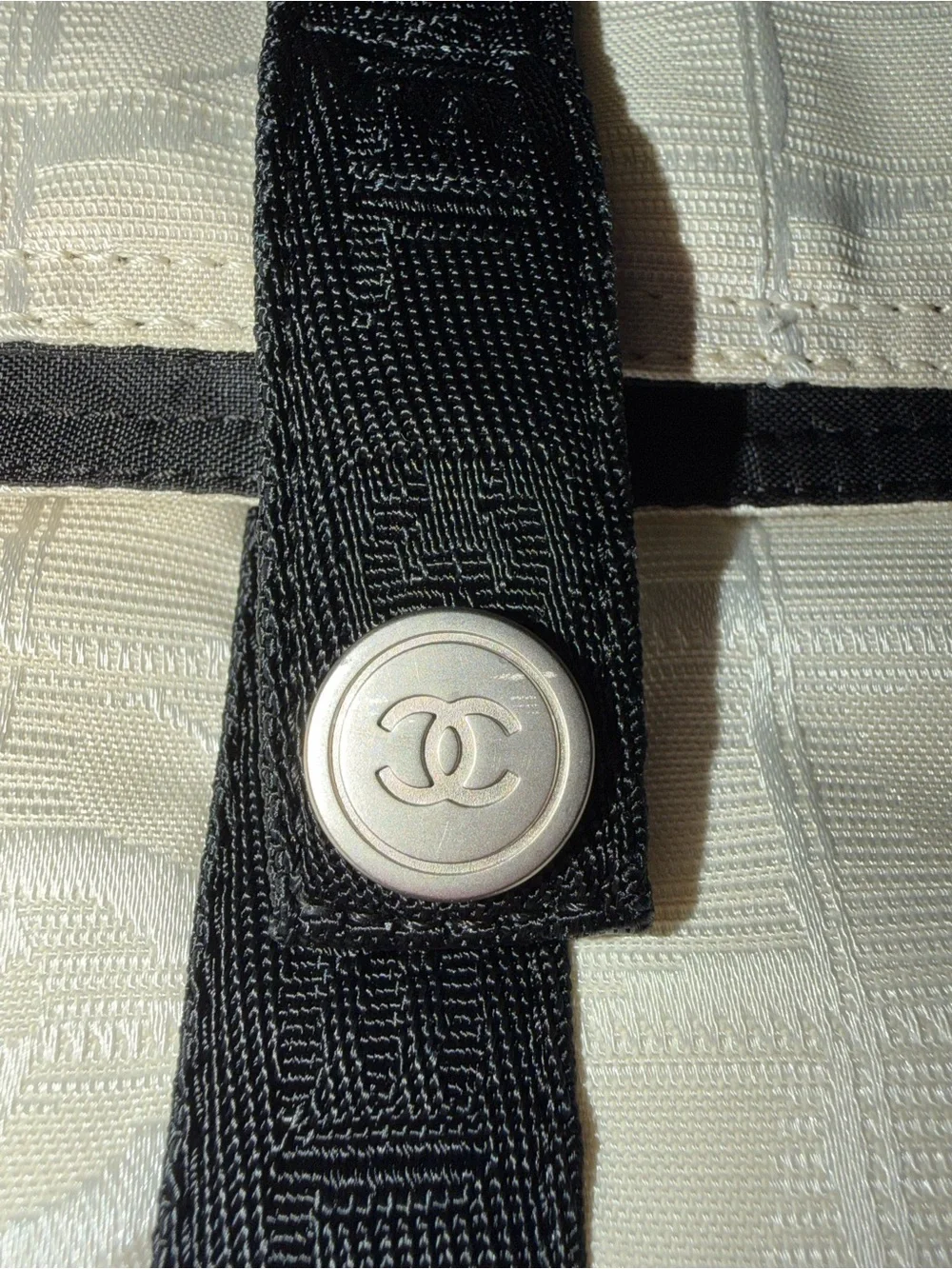 COA include CHANEL Cream and Black Messenger Bag with CC Patch